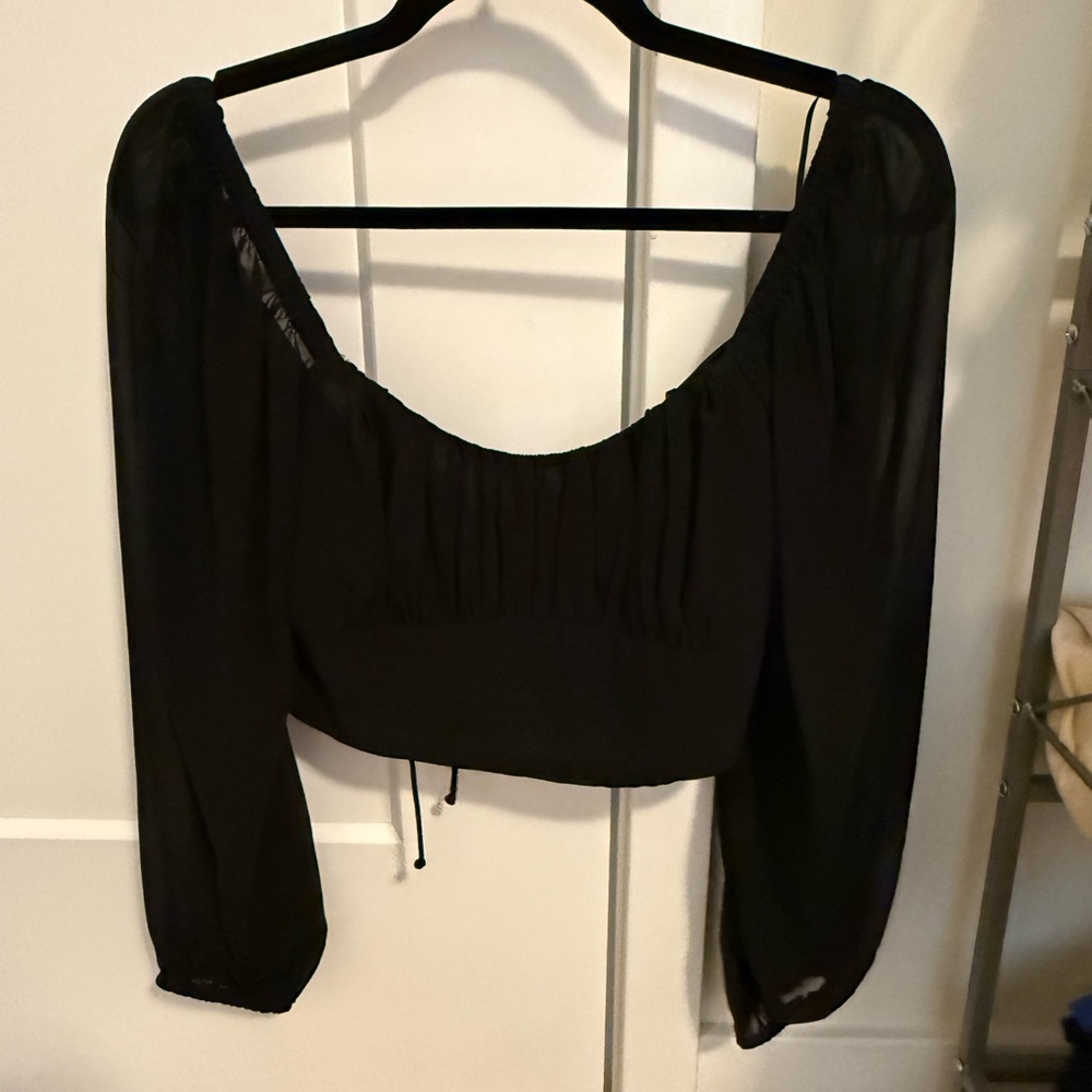 Cotton Candy LA size medium, black cropped house with an open back and ties